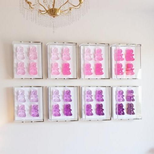 A radiant fusion of nostalgia and modern luxury, this jewel‑tone gummy bear sculpture is meticulously cast in premium resin and displayed within a museum‑grade, UV‑protected shadow box. Each bear glows with gemstone richness—deep sapphire, amethyst, ruby, citrine, or emerald tones—capturing light like a miniature piece of candy‑inspired fine art.