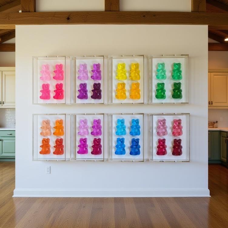 A radiant fusion of nostalgia and modern luxury, this jewel‑tone gummy bear sculpture is meticulously cast in premium resin and displayed within a museum‑grade, UV‑protected shadow box. Each bear glows with gemstone richness—deep sapphire, amethyst, ruby, citrine, or emerald tones—capturing light like a miniature piece of candy‑inspired fine art.