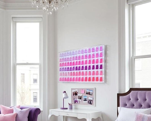 3D pop art sculpture of a pink ombré  translucent gummy bear, displayed in a clear acrylic shadow box against a white background." Brahe Art Company Original Creation