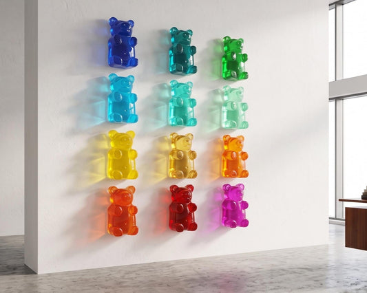 Giant 7 Inch Gummy Bear Wall Sculpture! Perfect for creating fun wall decor, this vibrant resin sculpture captures the adorable and iconic look of a gummy bear in a bold, eye-catching size. Whether you're decorating a kids' room, a playful gallery wall, or looking for a unique accent piece, this sculpture is sure to stand out.